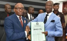 L- R : The Director -General, Bureau of Public Procurement (BPP) Dr. Adebowale Adedokun receiving hand over notes from the immediate past Acting Director-General BPP. Barr. Olusegun Omotola. At the hand over ceremony in the BPP conference room. Date:  November 18, 2024.